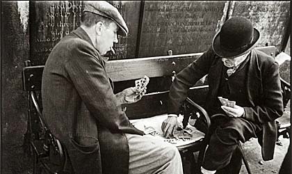 Card Players Whitechapel, in the cemetry graveyard of St. Georges Card Players Whitechapel, in the cemetry graveyard of St. Georges by Humphrey Spender (1910 - 2005)